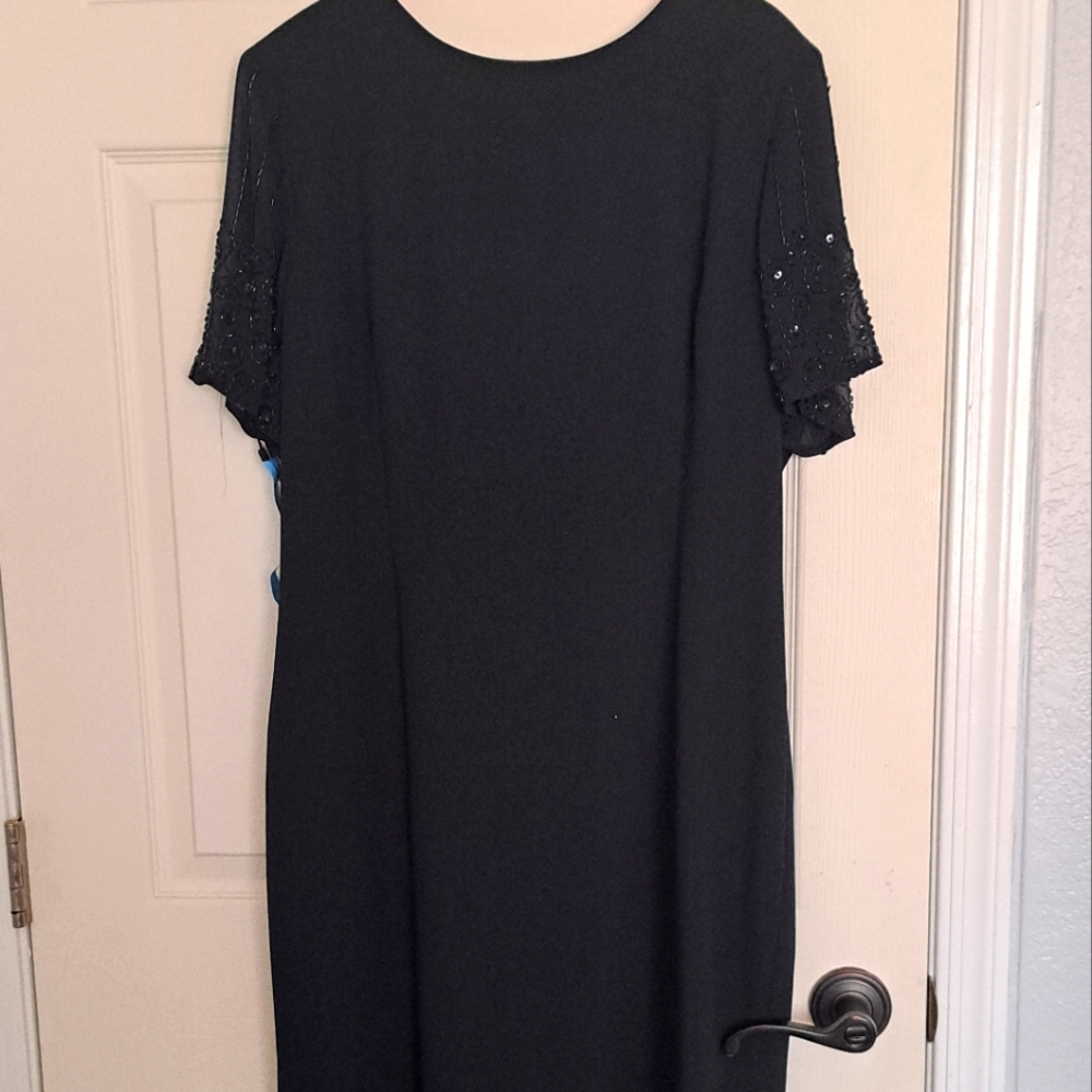 Evening or special event elegant black dress size 14.